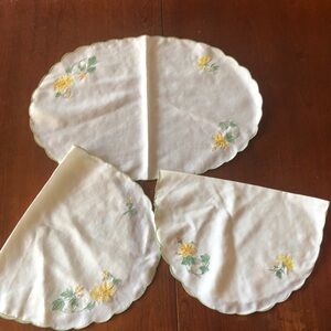 3 Vintage oval embroidered placemats/ white, green, and yellow flowers